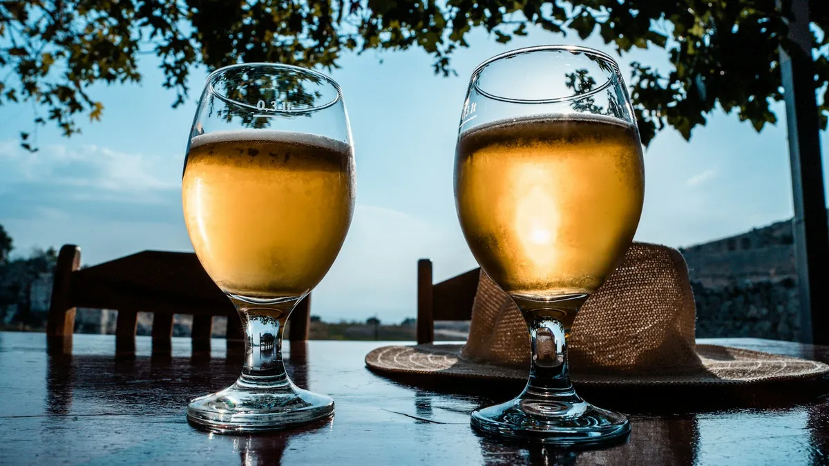 Glasses of beer on a table