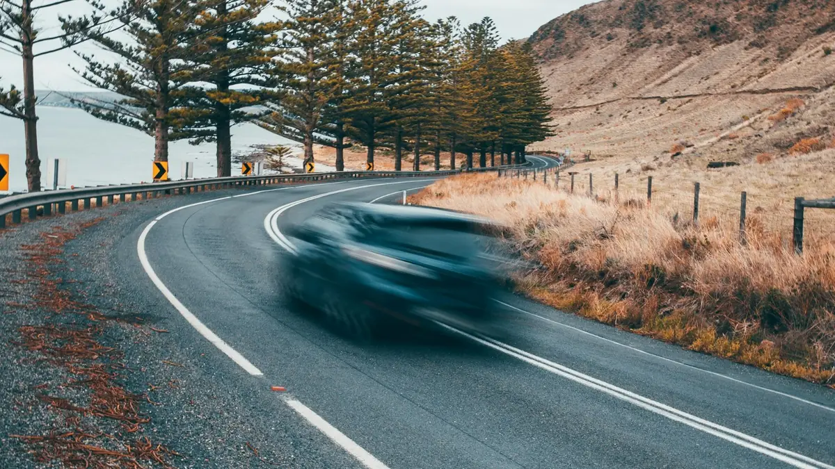 Car driving on a two way road